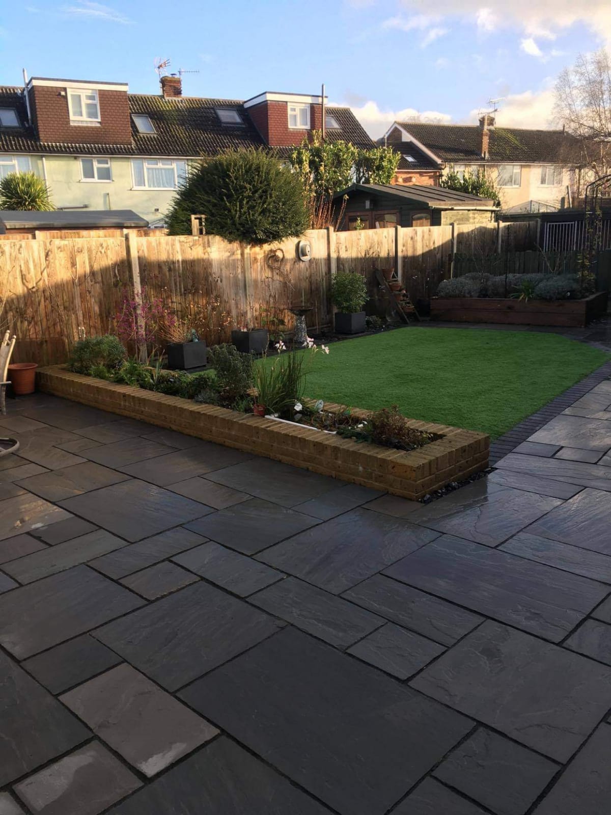 Artificial grass with paving by Admire Landscapes