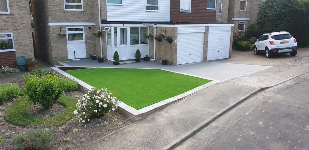 Front garden with artificial grass and driveway